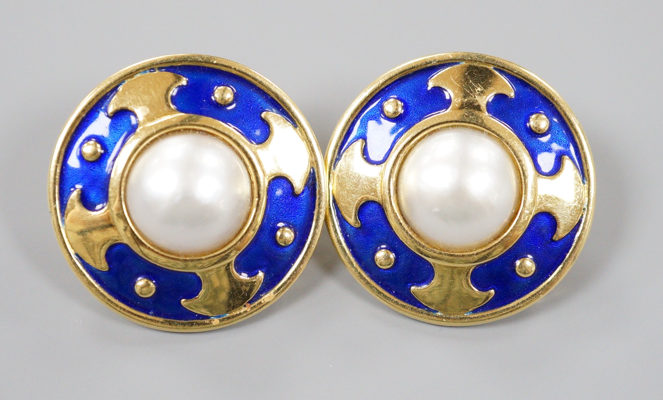 A modern pair of 18ct gold mabe pearl and blue enamel set disc earrings, diameter 25mm, gross weight 17.4 grams.